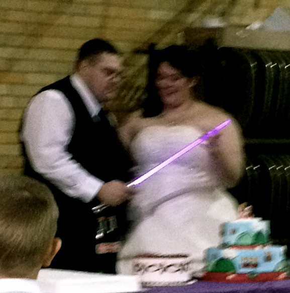 lightsaber cake cutting